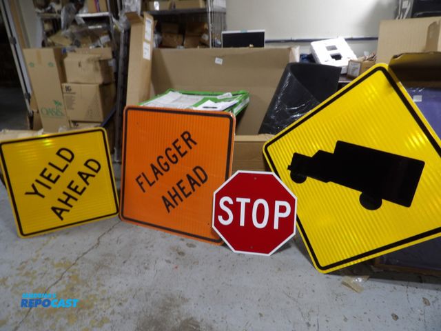 Lot 2-53307 - lot of (4) new engineered grade aluminum traffic signs, (1) yield 24 x 24 (1) stop 18 x 18 (1) truck...