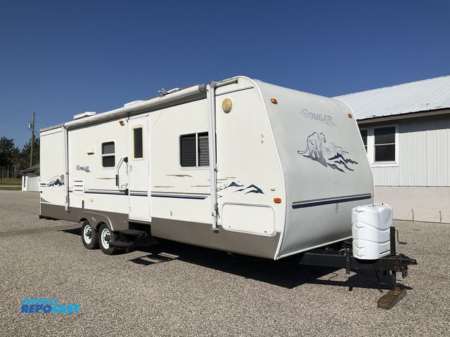 Lot 2-61774 - 2004 Cougar 24' Camper Travel Trailer