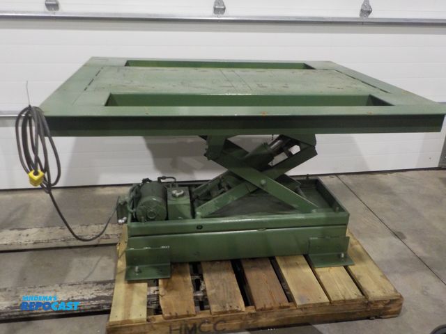 Lot 2-33870 - Industrial Scissors lift table, top measures 47-3/4”x56”, 120 voltpower hydraulic unit. Floor mounts...