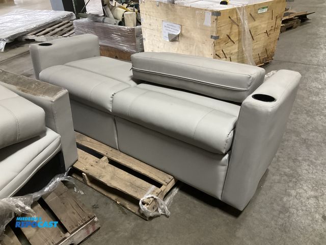 Lot 2-61959 - Gray RV 2 cushion Sofa with cupholders approx. 71” x 24” - missing one of the back cushions