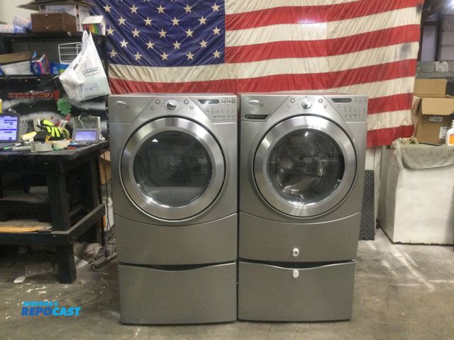 Lot 2-17045 - Scratch & Dent Whirlpool duet frontload washer and electric dryer set on storage pedestals High effi...