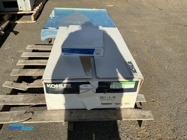 Lot 2-67675 - Kohler cast iron self rimming sink. Comes with a Mainline kitchen faucet. Hi-Rise