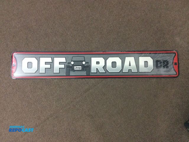 Lot 2-19001 - New metal  Jeep OFF ROAD DR sign. Measures 30” X 5”