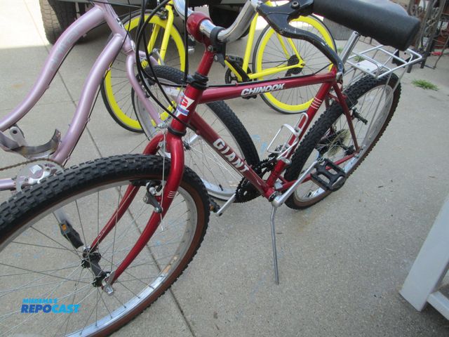 Lot 2-59077 - (3) adult speed bikes - yellow frame w/ " $ " logo, 1 giant chinook, 1 pink revolution logo