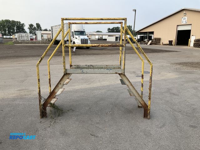 Lot 2-40351 - Metal stairway bridge with railings, approx 37” from the ground to bottom of the bridge platform, 24...