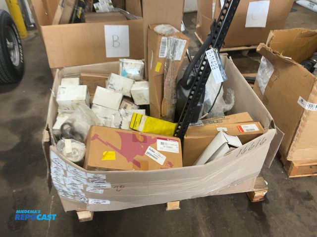 Lot 2-11429 - Skid of assorted new semi truck parts, includes mirrors, hose, o-rings, rivets, fuel filters, height...