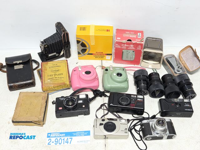 Lot 2-90147 - lot of assorted film cameras and accessories.