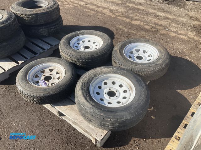 Lot 2-33616 - (4) misc trailer tires on 5-bolt steel wheels