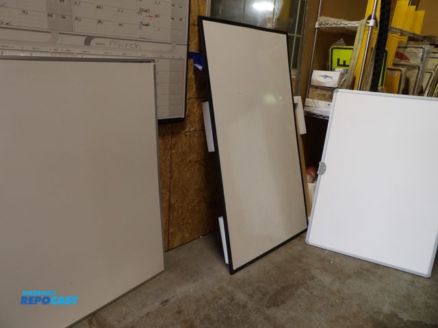Lot 2-53275 - Lot of (4) new asst. dry erase board (1) 30" x 5' black frame, (1) 30" 44" silver frame, (2) 34 x 48...