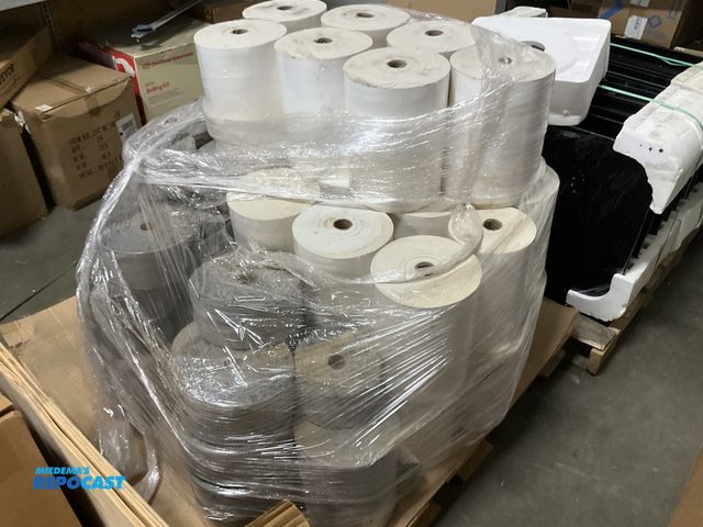 Lot 2-33250 - Skid of rolls of fabric white and gray rolls length unknown