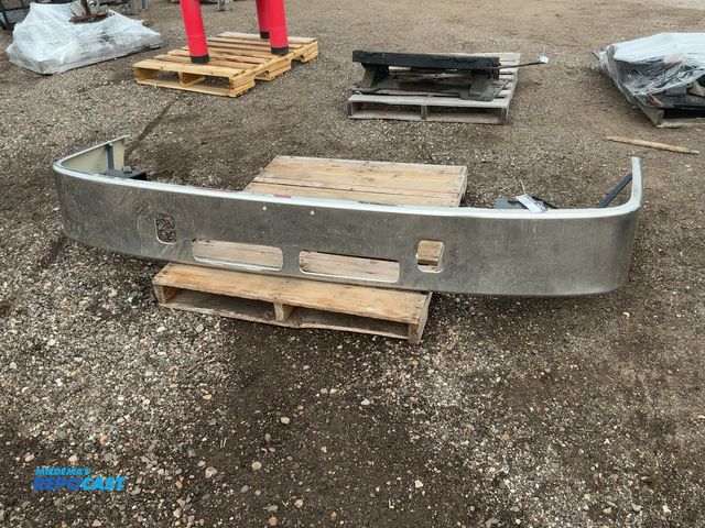 Lot 2-11321 - Used Volvo Semi Truck Front Bumper, has some dings and scratches, Hendrickson Part Number 8086795