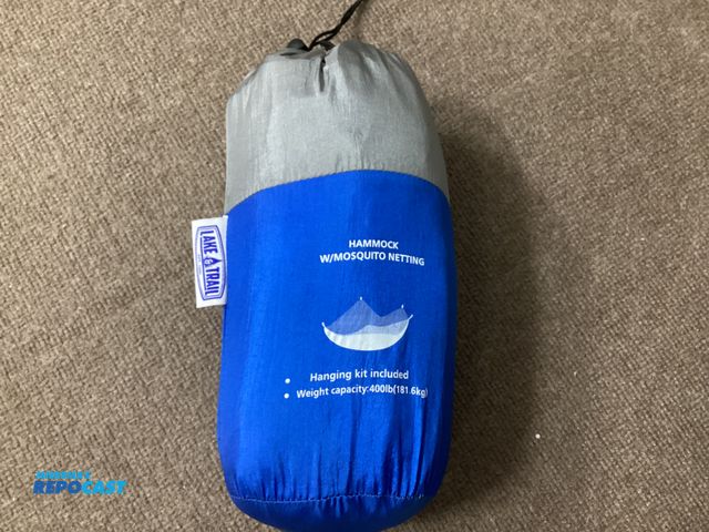 Lot 2-95849 - New Lake and Trail hammock with mosquito netting. Hanging kit included. Weight capacity 400 pounds.