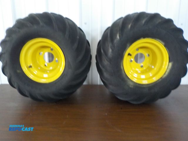 Lot 2-23976 - Lot of (2) Goodyear 21x11 tractor tires, 4 bolt tires