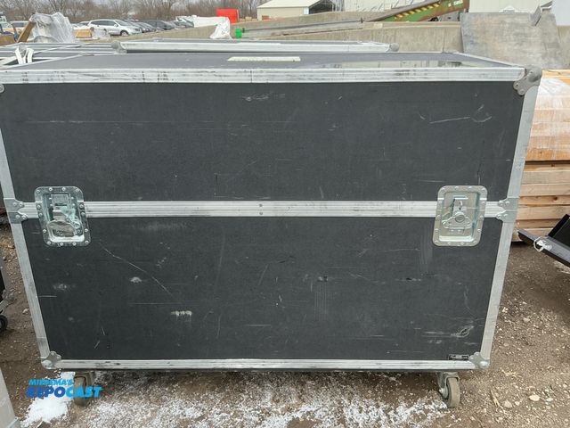 Lot 2-73523 - Approx. 54”w x 25.5”d x 40.5” tall Rolling latching Tv Stand