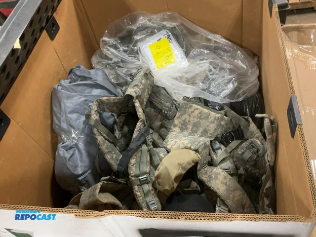 Lot 2-14713 - Large tote of military surplus: vests, sleep mats, baggage, eye ware, straps