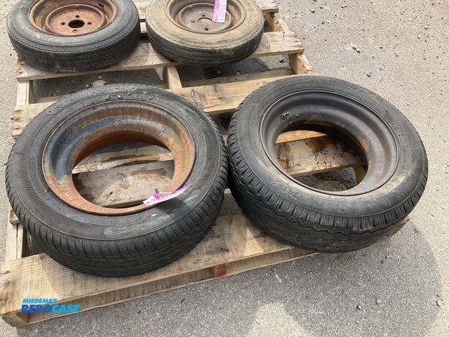Lot 2-22779 - (2) 215/60D14.5 tires on steel mobile home style wheels, used