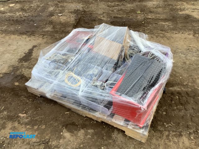 Lot 2-92352 - Skid of assorted computer parts and supplies including keyboards, mice, and wires