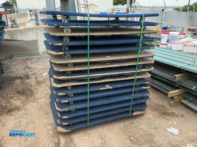 Lot 2-10252 - Stack of (15) Carpeted Wooden 4-Wheel Dollies, 36” x 54”