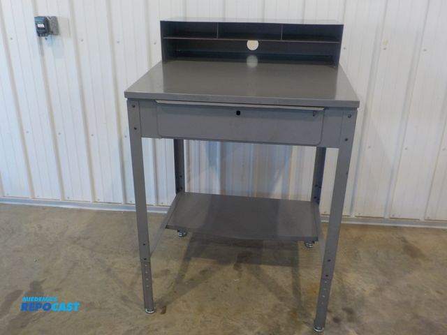 Lot 2-34215 - Industrial personal work station. One pull out drawer. Upper cubbies. Bottom shelf. Adjustable feet....