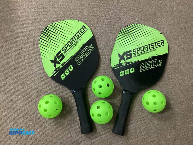 Lot 2-91279 - New Sportster Pickleball set. Includes 2 paddles and four balls in carrying case.