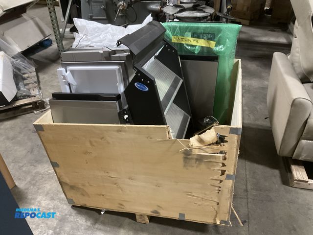 Lot 2-19639 - Skid lot of RV parts including: step above rv steps, assorted sized mini fridge refers, air hose… et...