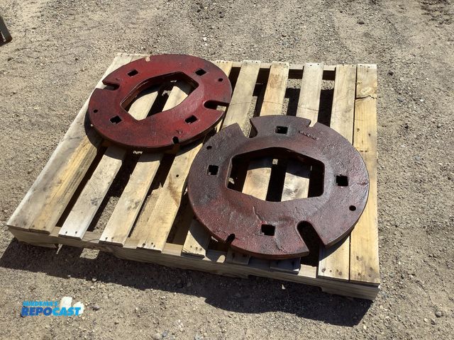 Lot 2-34765 - international harvester farm tractor rear wheel weights - matched set of (2) heavy rear wheel weight...