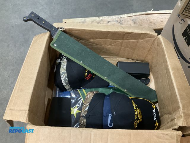 Lot 2-96824 - lot of various ballcaps, knives, a sign, flag, machete, pennant...