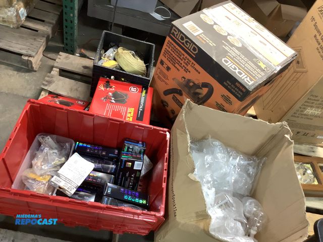 Lot 2-33185 - Skid lot of items including gloves roadside emergency tool and auto kits ratchet straps rigid 16 gal...