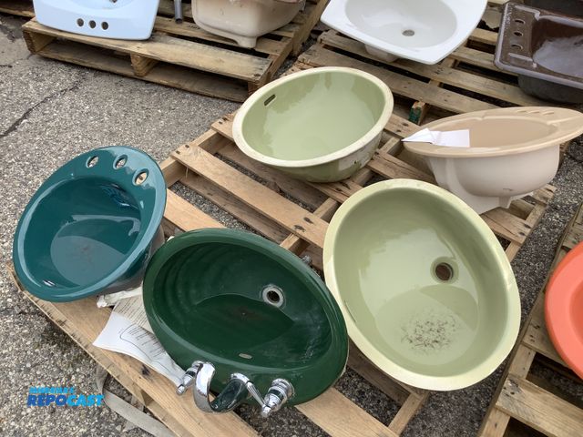 Lot 2-33765 - Skid of (5) ceramic sinks multi color including tan, light green, dark green with a faucet, and teal