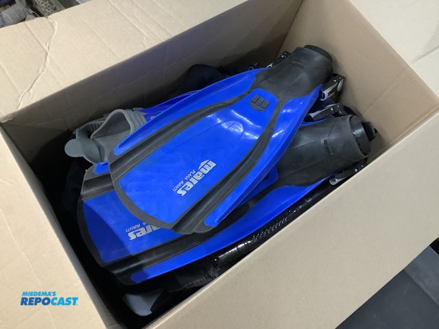 Lot 2-75574 - Lot of various scuba diving gear including a woman’s wetsuit, (4) pairs of scuba diving fins, goggle...