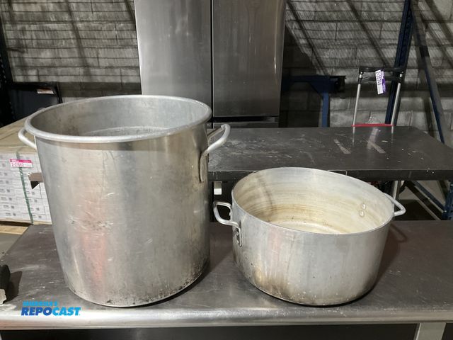 Lot 2-55079 - Lot including (1) 40qt. And (1) approx. 20qt. Stockpot. (No lids)