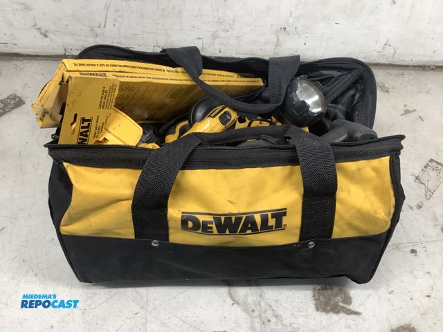 Lot 2-27638 - Dewalt bag and tools including flash lights and a charger and a battery and more