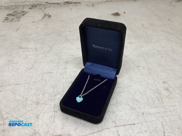 Lot 2-74024 - New Tiffany &amp; Co. full heart pendant in sterling silver Tiffany blue enamel finished heart