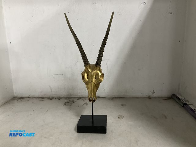 Lot 2-65609 - Sculpture (1) 19” tall decorative scull sculpture.