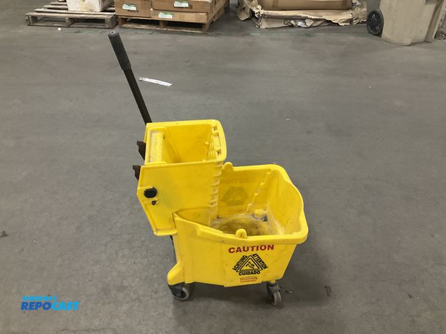 Lot 2-67870 - rubbermaid mop bucket with winger