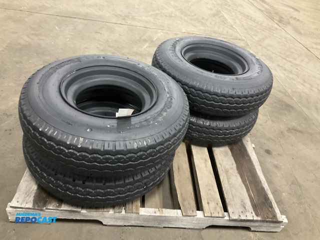 Lot 2-42679 - (4) 8-14.5 tires on steel mobile home style wheels, used