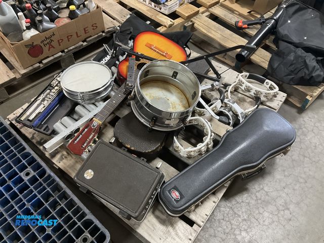 Lot 2-96853 - Skid lot of musical instruments including guitar, flute, drums, clarinet, violins, tambourines