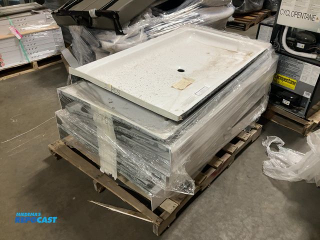 Lot 2-74123 - Skid lot of (8) fiberglass RV shower bases, (1) is 30” x 48” and (7) are 29” x 54”