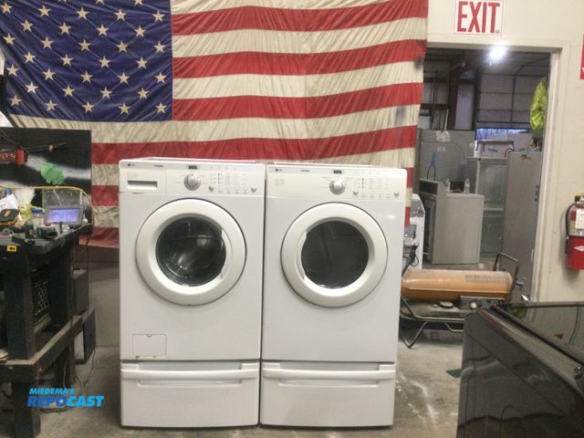 Lot 2-56639 - Electric LG Tromm on storage pedestals front load set Washer & Dryer Set washer
5 cycles
5 temps
5 s...
