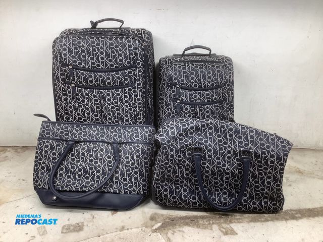Lot 2-94746 - Lot of (4) Calvin Klein luggage set Barely used original Calvin Klein luggage sets