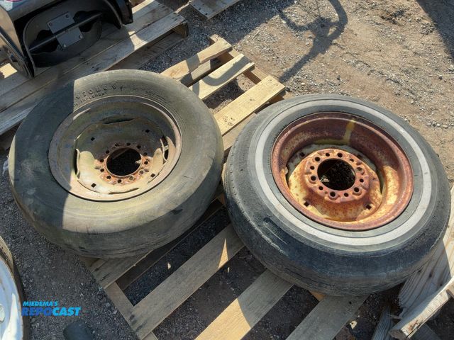 Lot 2-67762 - (2) matching John Deere tractor and implement Front Wheels and Tires, heavy duty, universal fitting,...