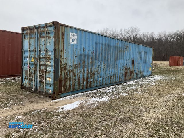 Lot 2-23921 - 40’ High Cube Shipping/ Storage Container, 9’ 6” T x 8’ W, swing doors on one end, wood deck, tie do...