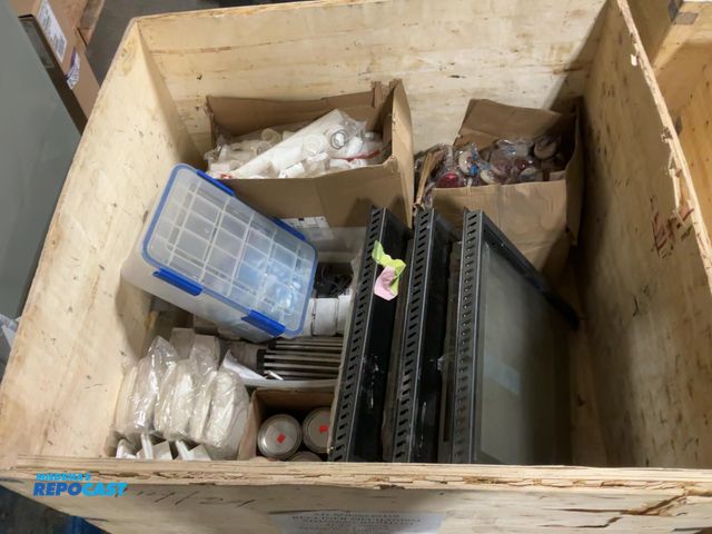 Lot 2-60466 - Crate of Miscellaneous RV Parts Including Roof Coating, Vent Covers, Miscellaneous Small Lights, End...