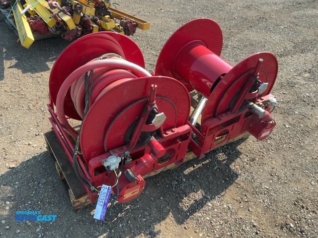 Lot 2-30357 - (2) Hannay Electric Hose Reels, one has a 1" hose on it, 12 volt, inside width of reels is approx. 2...