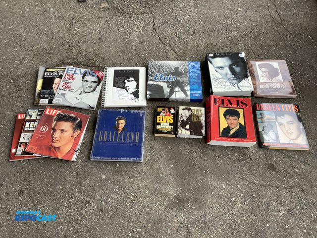 Lot 2-27205 - Lot of assorted Elvis books, magazines, and scrapbooks