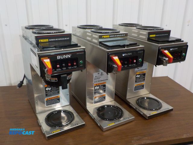 Lot 2-34071 - Lot of (3) Bunn CW series coffee makers. Hot water spout. Two upper heat plates. 115 volt power cord...