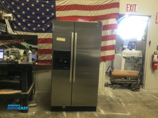 Lot 2-56630 - Kenmore cold spot side by side Refrigerator/Freezer Kenmore side by side
cold spot
in door ice and w...