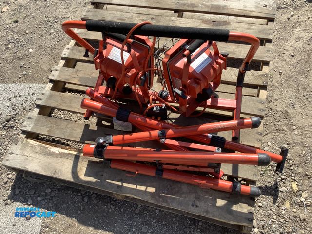 Lot 2-91169 - set of (2) large power light halogen work lights w/the design edge stand