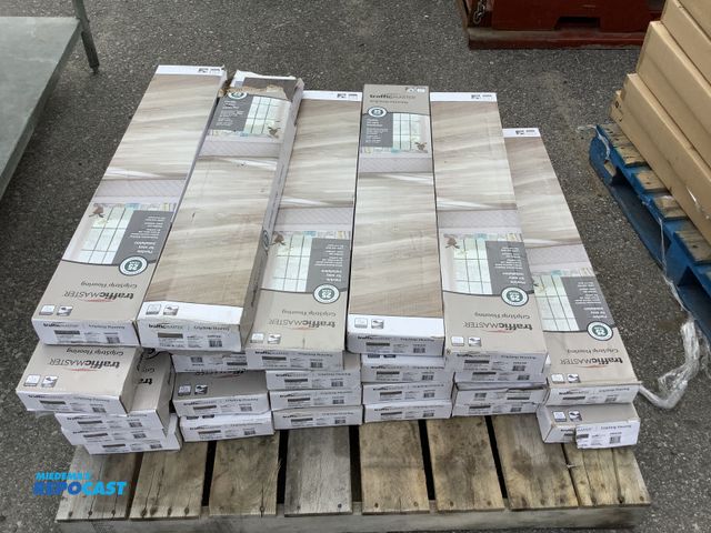 Lot 2-10301 - Traffic Master Skid lot of (24) cases of grip strip wood flooring -khaki oak dark
