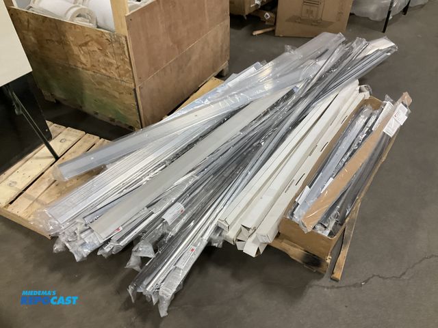 Lot 2-69615 - Large skid lot of packaged aluminum trim channels and frame rails for windows,